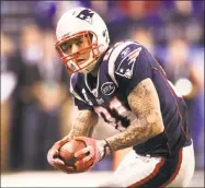  ?? Doug Mills / The New York Times ?? Patriots tight end Aaron Hernandez runs the ball during Super Bowl XLVI on Feb. 5, 2012.