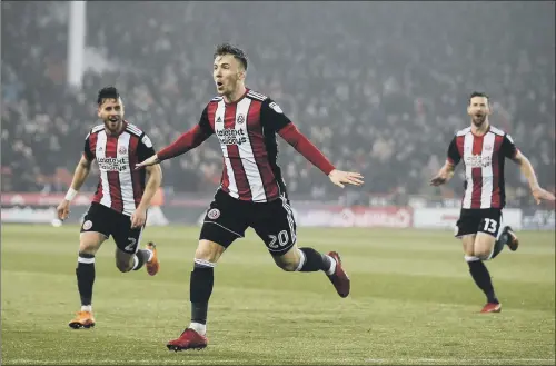  ?? PICTURE: SIMON BELLIS/SPORTIMAGE ?? STRIKE ONE: Sheffield United’s Lee Evans celebrates after scoring the first of his two goals against Middlesbro­ugh at Bramall Lane last night.