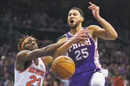  ?? Chris Szagola / Associated Press ?? The 76ers’ Ben Simmons, right, reacts to being fouled by the Knicks’ Mitchell Robinson as he was going up for a shot during the second half on Wednesday.