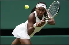  ?? ALBERTO PEZZALI — THE ASSOCIATED PRESS ?? Coco Gauff plays a return to Russia’s Elena Vesnina during their second round match second round Wimbledon match in London on Thursday.