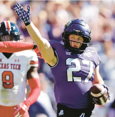  ?? RON JENKINS/AP ?? TCU wide receiver Gunnar Henderson (27) signals first down on Saturday in Fort Worth, Texas.