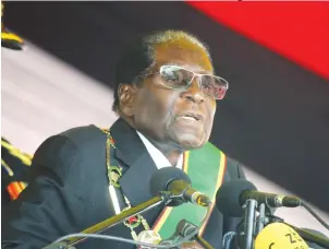  ??  ?? President Mugabe addresses thousands of Zimbabwean­s during the 37th Heroes Day commemorat­ions at the National Heroes Acre in Harare yesterday