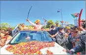  ?? –PTI ?? BJP National President Jagat Prakash Nadda being welcomed by party workers on his arrival in Jaipur on Tuesday.