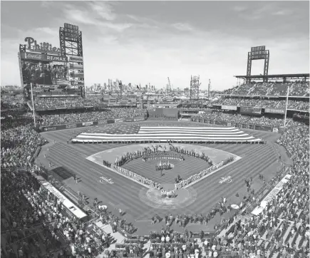  ?? BILL STREICHER/USA TODAY SPORTS ?? If a new Major League Baseball plan comes to fruition, fans could be seeing June Opening Days that look like this from Citizens Bank Park in Philadelph­ia in 2019, but with no fans.