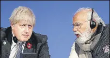  ?? GETTY IMAGES ?? Prime Minister Narendra Modi and his British counterpar­t Boris Johnson at the COP26 summit in Glasgow in 2021