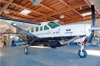  ?? ?? A Cessna 208B Grand Caravan which has been outfitted with autonomous flying equipment is seen at Xwing headquarte­rs in Concord, California.