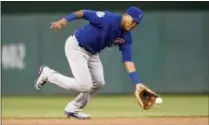  ?? NICK WASS — THE ASSOCIATED PRESS FILE ?? Cubs shortstop Addison Russell fields a ground ball last season in Washington.