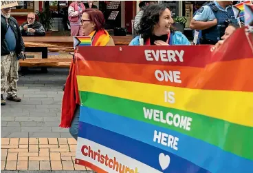  ?? KAI SCHWOERER/ STUFF ?? Coming out could still be a scary experience in NZ. In June, a Pride Walk of Support marked the start of Pride Week in Christchur­ch was met with some protest.