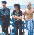  ?? Pictures: Martin Mayer ?? Punks and a skinhead at Margate in 1986