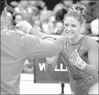  ?? NWA Democrat-Gazette/ANDY SHUPE ?? Arkansas senior Amanda Wellick tied for the bars title with a score of 9.9 and scored no lower than 9.825 on her three events last week against Kentucky.