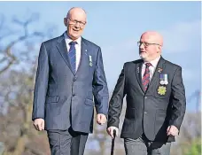  ?? ?? Falklands comrades memory lane
Norman, left, and Bill take a walk down