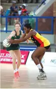  ??  ?? Zimbabwe goal shooter Pauline Jani’s (right) career is inspired by her late mother