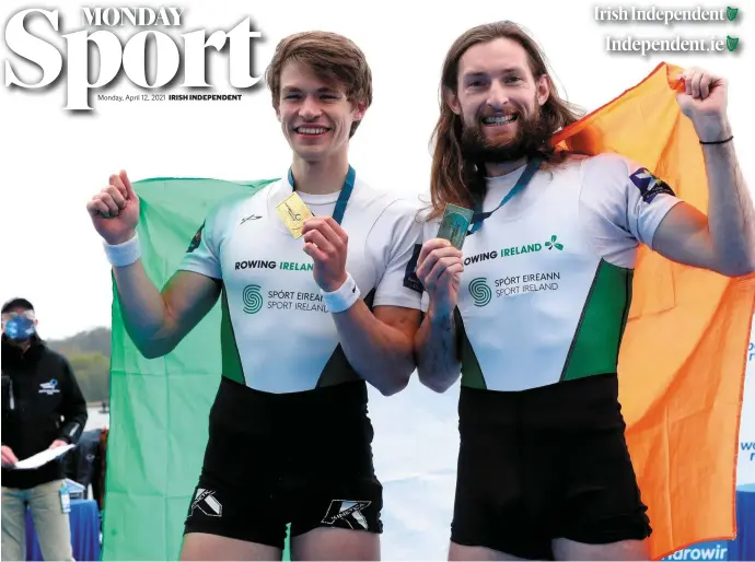  ?? ROBERTO BREGANI/SPORTSFILE ?? Fintan McCarthy and Paul O’Donovan celebrate with their gold medals after the lightweigh­t men’s double sculls final at the European Rowing Championsh­ips.