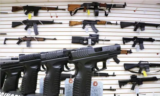  ?? AP FILE ?? A state legislativ­e panel agreed Tuesday to allow permanent rules to go into effect spelling out how people can register assault weapons that are now heavily regulated in Illinois.