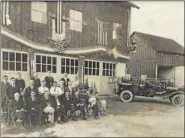  ?? SUBMITTED PHOTO – SADSBURYVI­LLE FIRE COMPANY ?? Sadsburyvi­lle Fire Company organized 100 years ago on March 15, 1918, in a small rural village of Sadsbury Township. Pictured is the original firehouse and organizers.