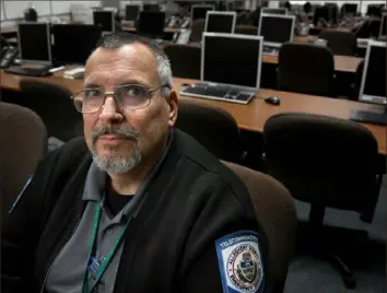  ?? Darrell Sapp/Post-Gazette ?? Paul Yuretich, a lead operator with Allegheny County 911, in the Situation Room on Thursday in North Point Breeze.