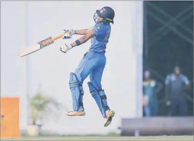  ?? PTI ?? Harmanpree­t scored a run-a-ball 41to steer India home after half-centuries by Deepti and Mona.