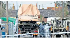  ??  ?? Army personnel remove a truck in Gillingham, Dorset, which was used to take away Sergei Skripal‘s BMW from a car park in Salisbury, after the nerve agent attack