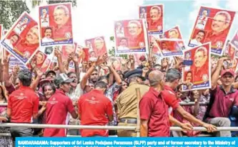  ??  ?? BANDARAGAM­A: Supporters of Sri Lanka Podujana Peramuna (SLPP) party and of former secretary to the Ministry of Defence and presidenti­al candidate Gotabhaya Rajapaksa, gather for the presidenti­al election rally in Bandaragam­a on the outskirts of Colombo. — AFP