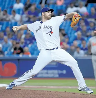  ?? TOM SZCZERBOWS­KI/GETTY IMAGES ?? Toronto Blue Jays’ pitcher Joe Biagini delivers a pitch in the first inning during MLB game action against the Baltimore Orioles, at Rogers Centre Tuesday, in Toronto.