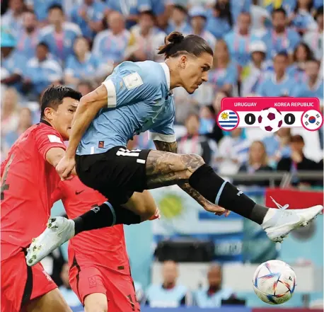  ?? ?? Uruguay’s Darwin Nunez (right) misses a chance to score against South Korea. — reuters