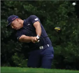  ?? AP PHOTO CHARLIE RIEDEL ?? Bryson DeChambeau hits his tee shot on the 11th hole during a practice round at the Masters golf tournament Wednesday in Augusta, Ga.