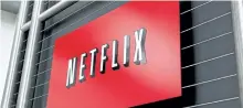  ?? RYAN ANSON/GETTY IMAGES ?? The Netflix company logo at Netflix headquarte­rs in Los Gatos, Calif. on April 13, 2011. The company is experiment­ing with new interactiv­e programmin­g.