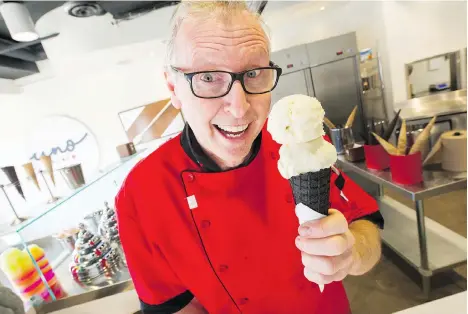  ?? ARLEN REDEKOP ?? James Coleridge shows off the new Buffalo Lemon water buffalo gelato at Uno Gelato in Kitsilano on Wednesday.