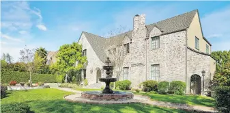  ?? RODEO REALTY ?? Television hitmaker Shonda Rhimes paid about $4.6 million for this renovated English Country-style home in Los Angeles’s Hancock Park neighbourh­ood.