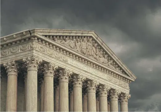  ?? J. SCOTT APPLEWHITE/AP ?? The political storm that could ensue if the Supreme Court backs Mississipp­i’s efforts to ban abortions starting at 15 weeks of pregnancy could see other states move to restrict abortions and legal challenges that might ultimately take on the landmark, 50-year-old Roe vs. Wade ruling.