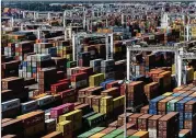  ?? ERIN SCHAFF/NEW YORK TIMES 2021 ?? Port of Savannah officials recently estimated 80,000 containers were stacked up at the facility. That’s roughly 60% more than before the pandemic.