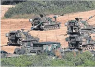  ??  ?? The South Korean Army on exercise at the border