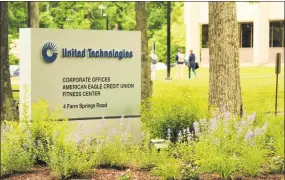  ?? Dan Haar / Hearst Connecticu­t Media ?? The United Technologi­es Corp. headquarte­rs in Farmington. The company plans to move its headquarte­rs to the Boston area after a merger with Raytheon Co. in 2020.