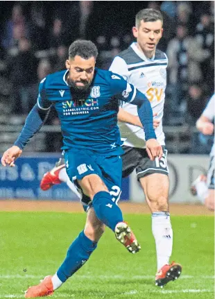  ?? Pictures: SNS. ?? Olly Crankshaw, left, fires home Dundee’s second goal in stoppage-time; Kane Hemmings, above, scores the Dark Blues’ opener.