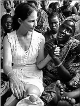  ?? SAM MEDNICK/AP ?? Actress Ashley Judd meets refugees Thursday in Juba, South Sudan, where rape is a widespread weapon.