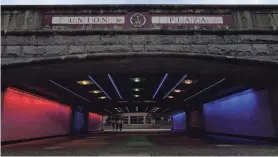  ?? PHOTOS BY KRIS CRAIG/THE PROVIDENCE JOURNAL ?? New lighting is unveiled at Waterplace Park tunnel on May 9. The lights serve a dual purpose, according to city officials. They brighten up a space that had previously drawn complaints about being dark and feeling unsafe.