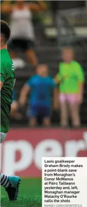  ?? RAMSEY CARDY/SPORTSFILE ?? Laois goalkeeper Graham Brody makes a point-blank save from Monaghan’s Conor McManus at Páirc Tailteann yesterday and, left, Monaghan manager Malachy O’Rourke calls the shots