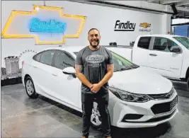  ?? Findlay ?? Walter Long Elementary School teacher Greg Winiewicz won a 2018 Chevrolet Cruze from Findlay Chevrolet.