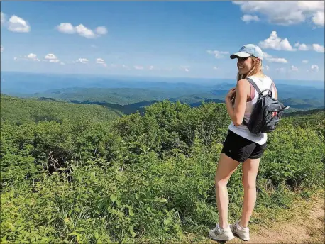  ?? PHOTO COURTESY OF SHIRLEY POWELL ?? Grace Powell, 19, takes in the view during a stop along the Blue Ridge Parkway.