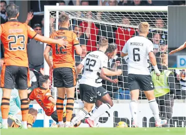  ??  ?? Tomi Adeloye opens the scoring for Ayr United but it wasn’t enough to pull the tie