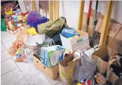  ??  ?? Donations for the group of Dakota Access Pipeline protesters from Albuquerqu­e are stored in Monty Singer’s North Valley painting studio.