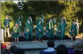  ??  ?? Graduates do the traditiona­l moving of the tassels during the Jim Elliot Christian High School graduation in Lodi on Monday.