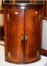  ??  ?? Above: this wonderfull­y useful corner cupboard, which came with a spare walnut mirror, sold for just £80 at Tennants