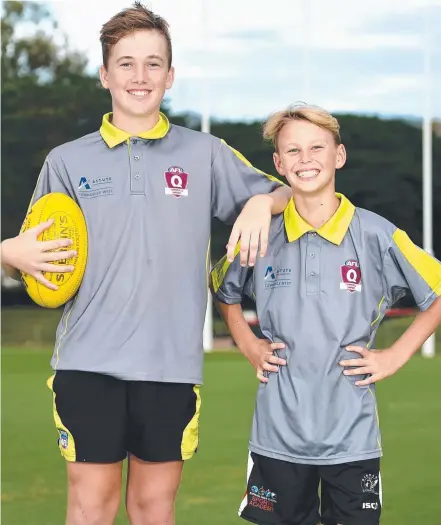  ?? GOING PLACES: Junior AFL umpires Allan Harding, 13, and Tylor Winnett, 13. Picture: ALIX SWEENEY ??