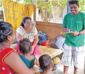  ??  ?? Child Fund NZ staff in Kiribati visit a family in Betio, Tarawa. They are supporting Kiribati with its COVID-19 preparedne­ss by delivering hygiene kits.