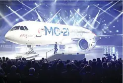  ??  ?? Russian Prime Minister Dmitry Medvedev attends a ceremony to present the Irkut MC-21 mid-range jet airliner at the Irkutsk Aviation Plant (Irkut Corporatio­n) in Irkutsk, June 8, 2016. (Reuters)