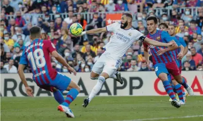  ?? ?? Barcelona and Real Madrid in La Liga action at the Camp Nou in October. Photograph: Antonio Villalba/Real Madrid/Getty Images