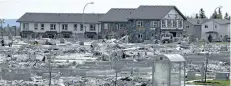  ?? THE CANADIAN PRESS FILES ?? A devastated area in Fort McMurray Alta, on June 2, 2016. Ontario researcher­s are finalizing plans to head to Fort McMurray to study dust left in homes from the forest fire that ravaged the area last year.