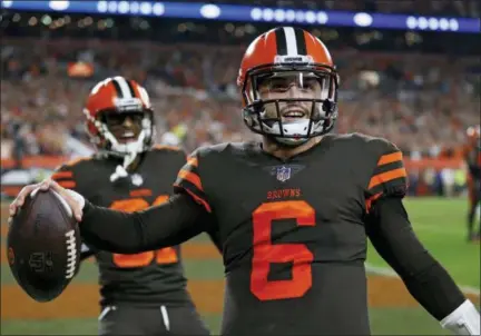  ?? RON SCHWANE — ASSOCIATED PRESS ?? Browns quarterbac­k Baker Mayfield celebrates after scoring a 2-point conversion during the second half against the Jets on Sept. 20 at FirstEnerg­y Stadium.