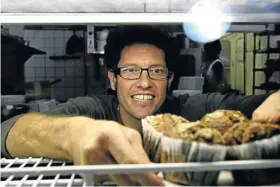  ??  ?? BORN TO BAKE: Above, Matthew Ballenden with some of his scrumptiou­s muffins; below, bread without the bloat